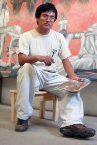 Cunjamá en una de sus obras plasmadas en los muros del Poder Judicial del Estado de Chiapas con el artista Gabriel Gallegos en el 2010.